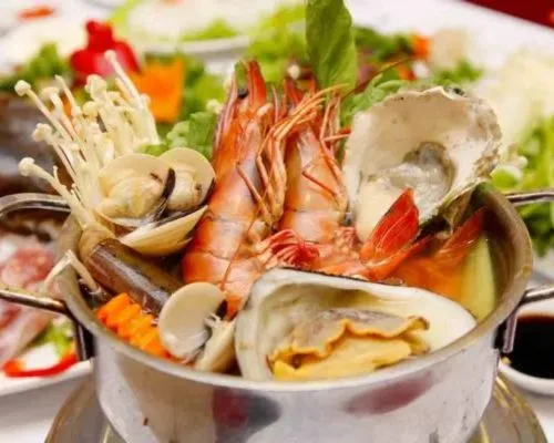 Không nên kết hợp hải sản cùng bia